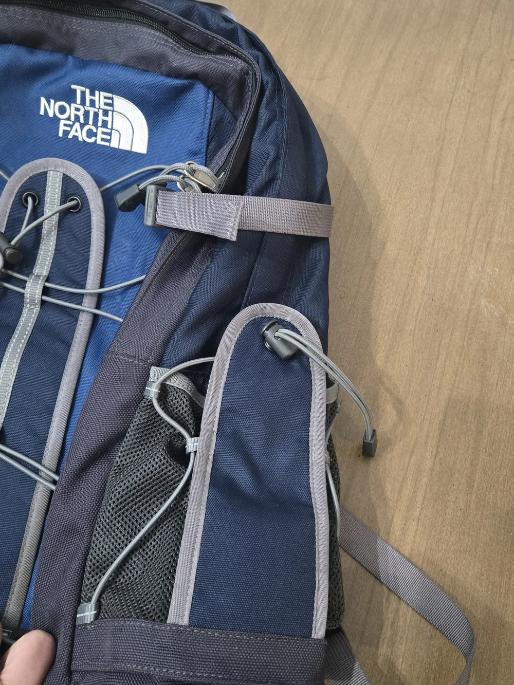 The North Face Slingshot Backpack in Navy and Charcoal